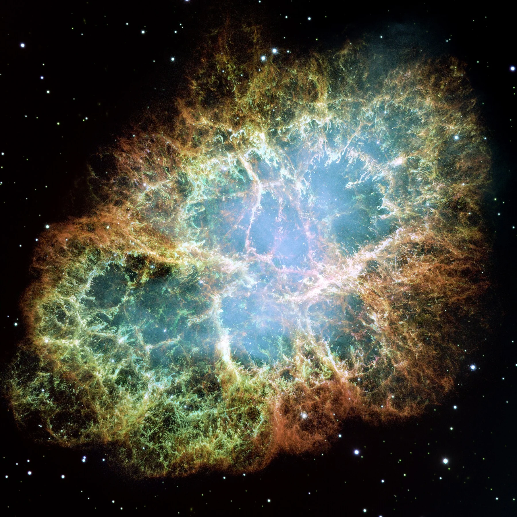 La nébuleuse du Crabe : mosaïque d’observations du télescope Hubble publiée en 2005. Les couleurs traduisent des observations astronomiques.